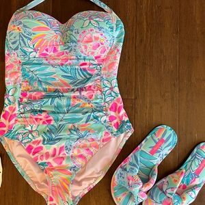 Lilly Pulitzer bathing suit new with matching flip flops.